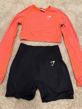 Gymshark Coral Long-Sleeve Crop Top with Black Seamless Shorts